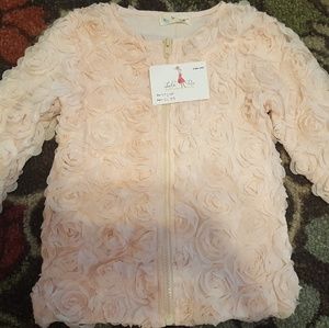 peach colored little girls jacket